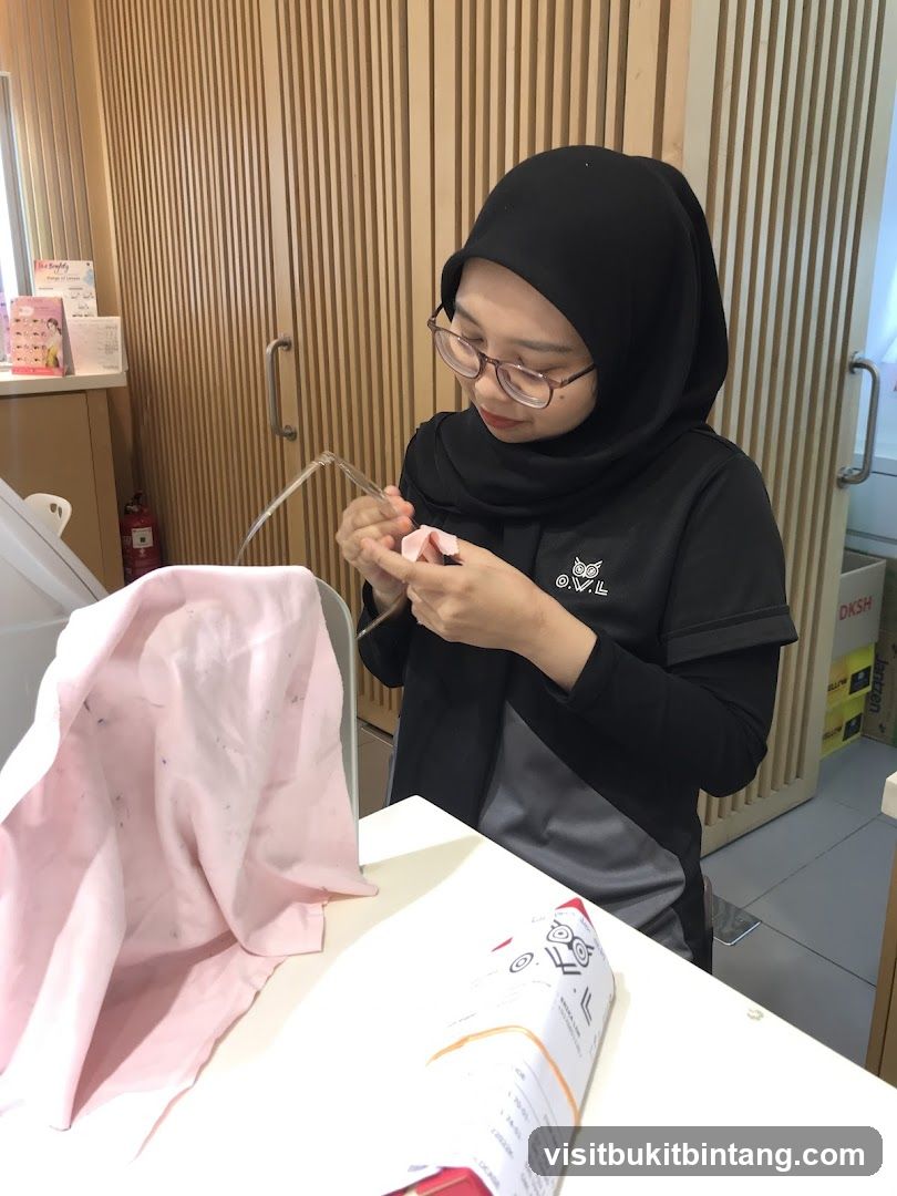 Woman cleaning eyeglasses