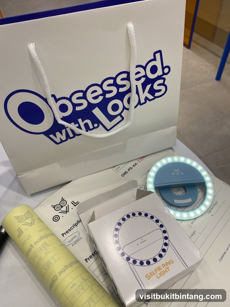 Obsessed with Looks shopping bag and selfie ring light