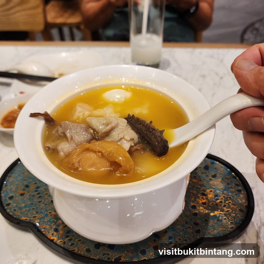 A bowl of soup with various ingredients