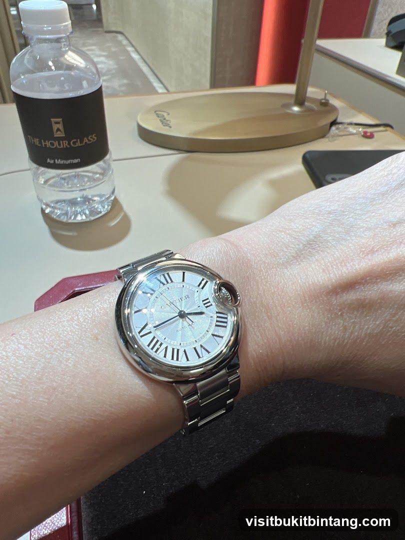 Cartier Watch and Water Bottle