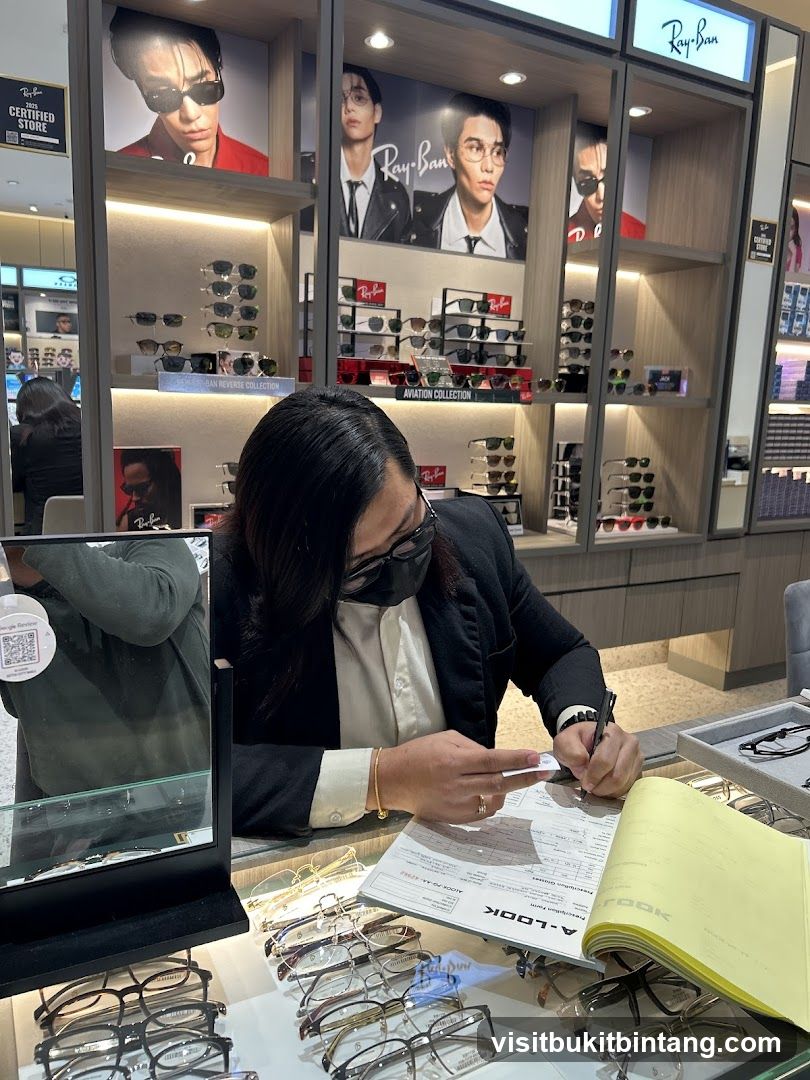 Optician assisting customer