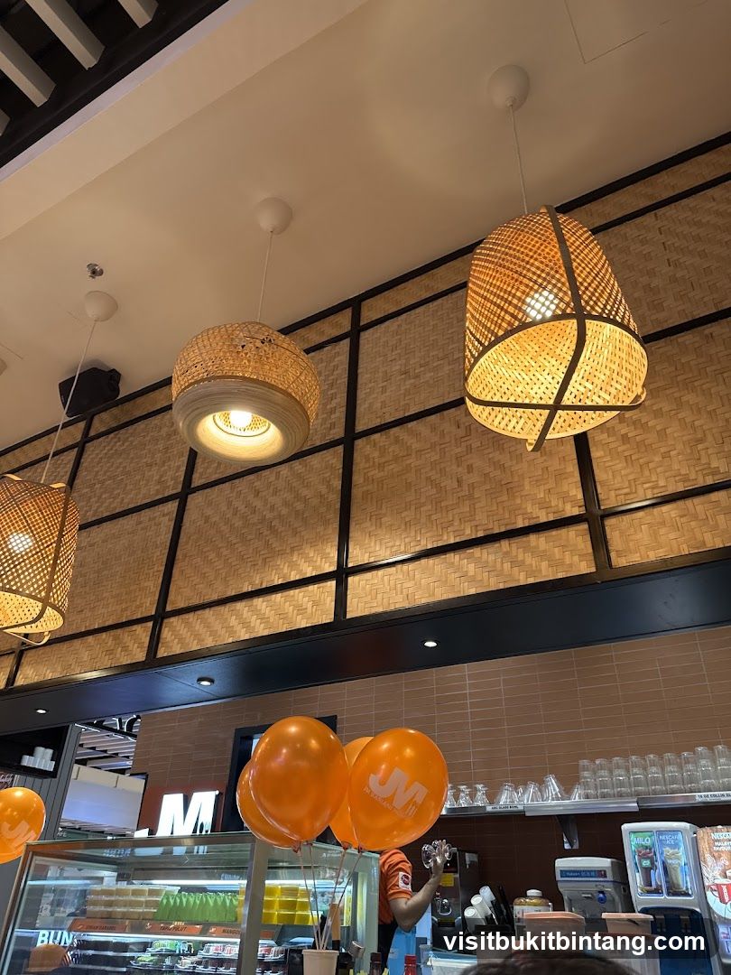 Restaurant Interior with Woven Lamps and Balloons