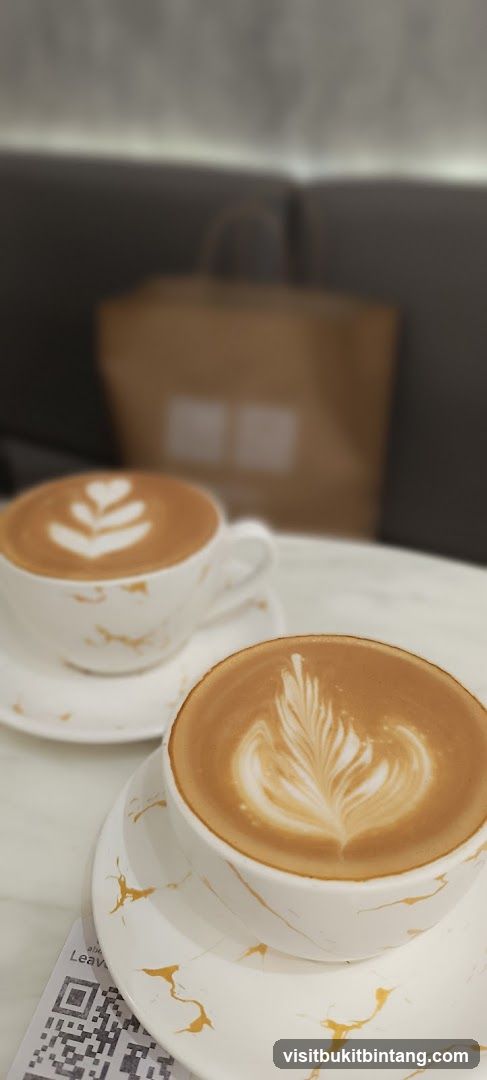 Two Lattes with Latte Art