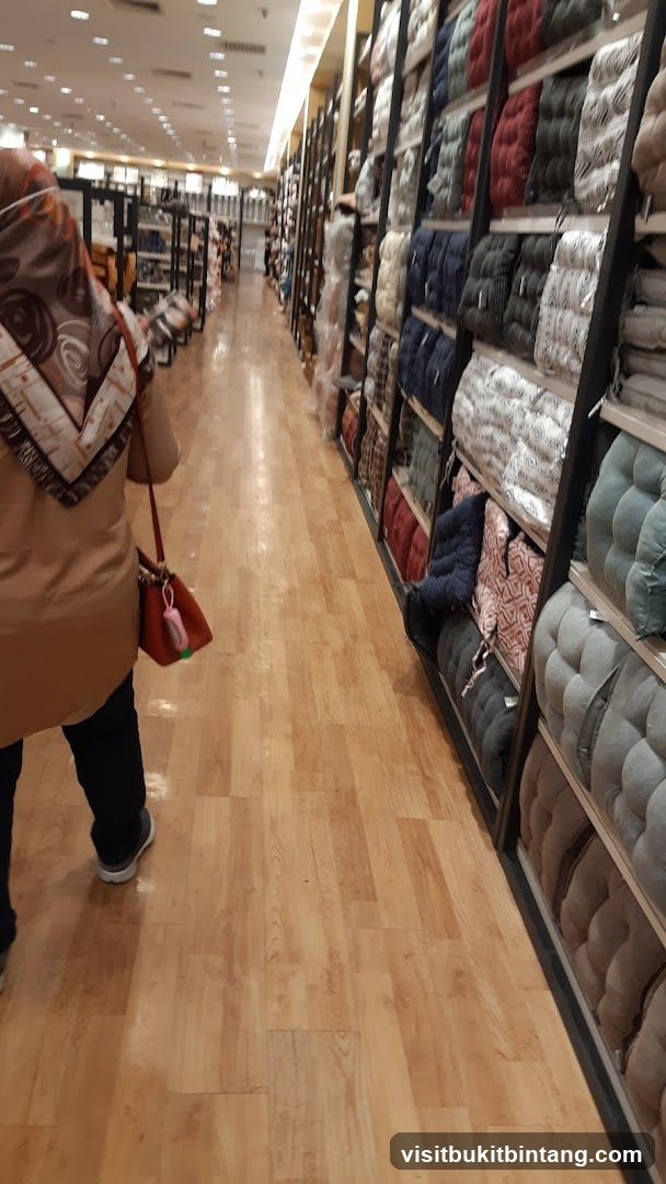 Store aisle with cushions