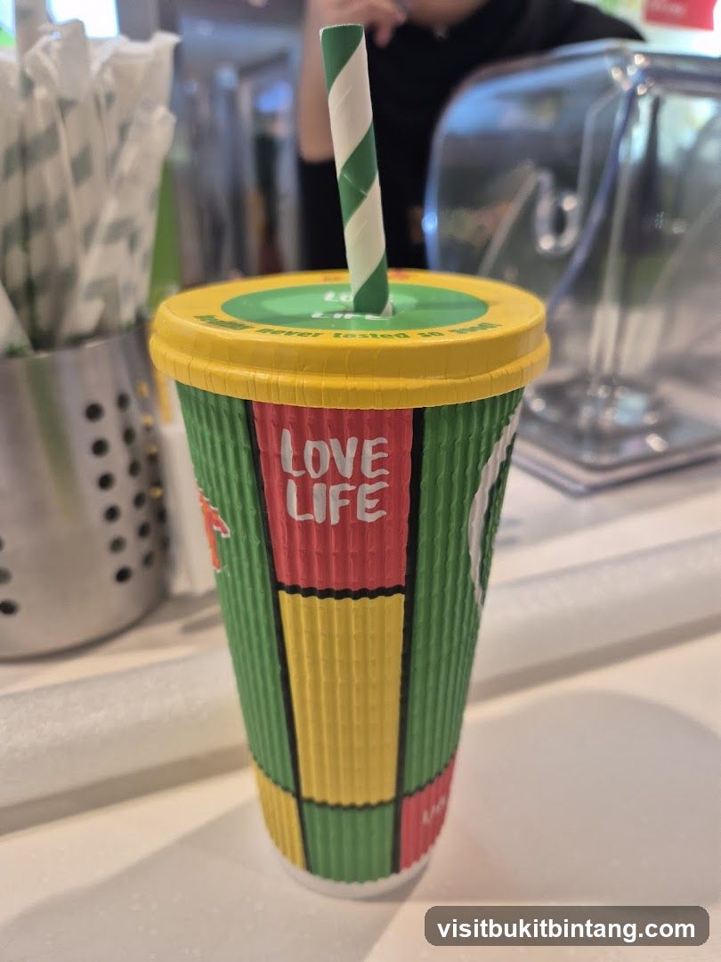 Drink cup with straw