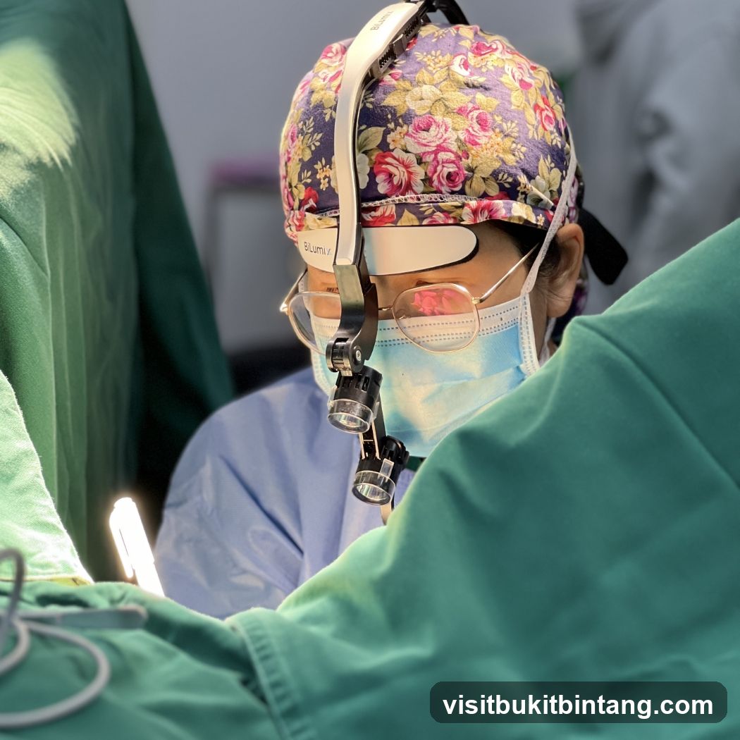 Surgeon wearing loupes and surgical cap