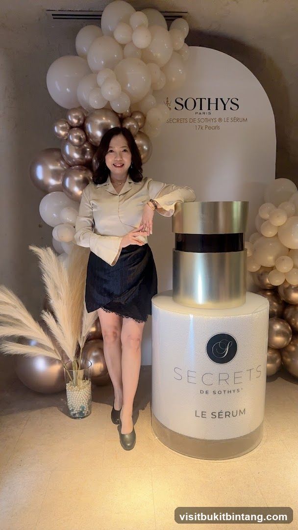Woman Posing with Sothys Product Display
