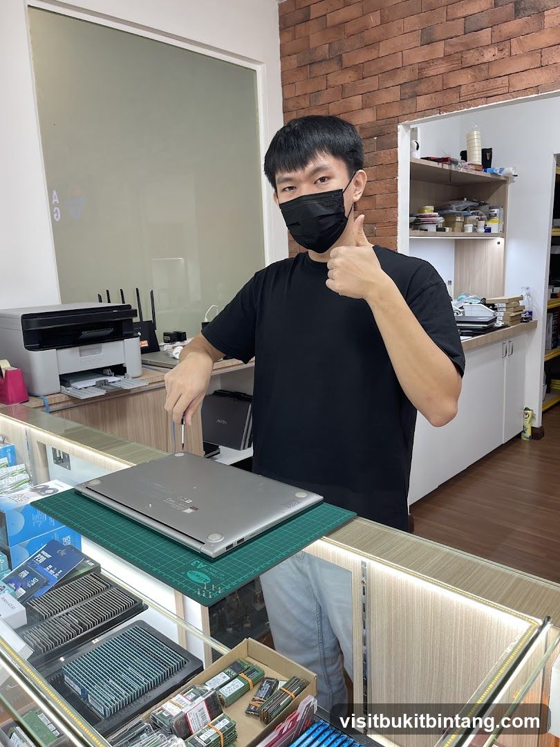 Technician working on a laptop