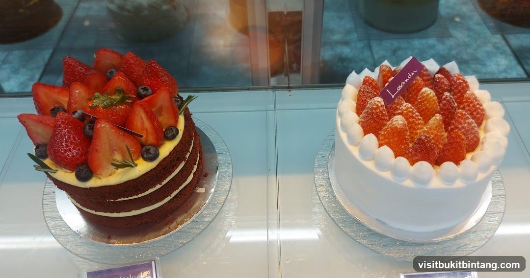 Two Cakes in a Display Case