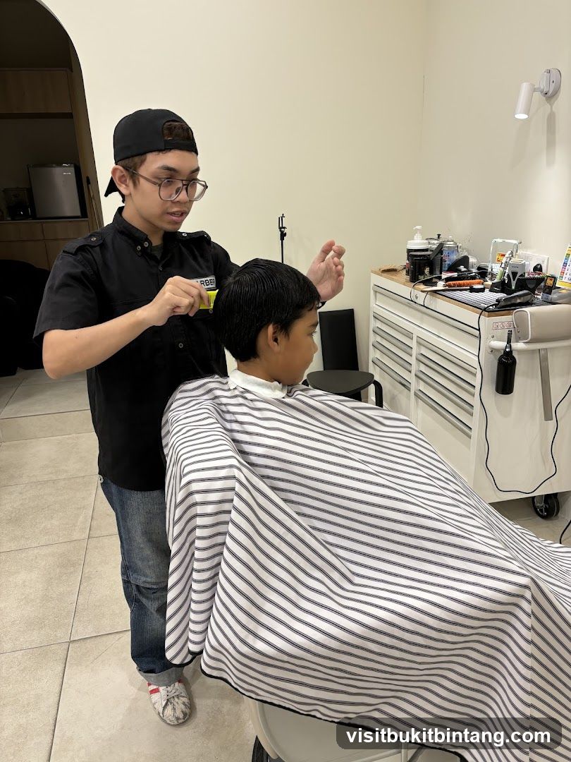 Barber cutting a child's hair