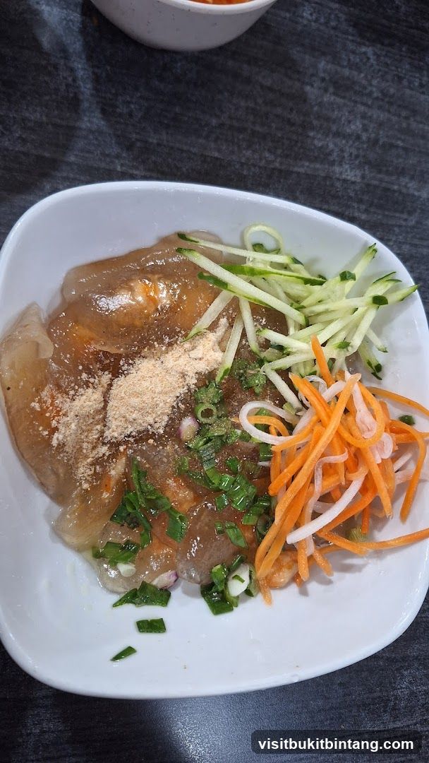 Dish with glass noodles and garnishes