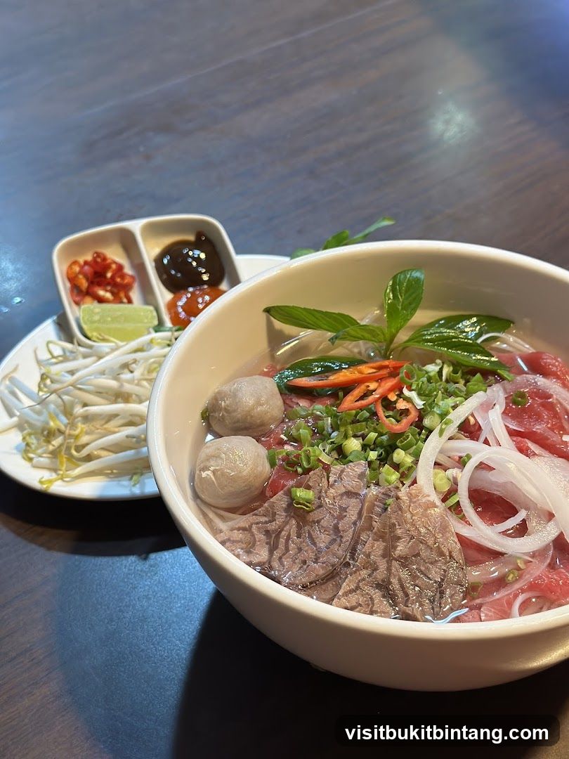 Bowl of Pho with Side Dishes