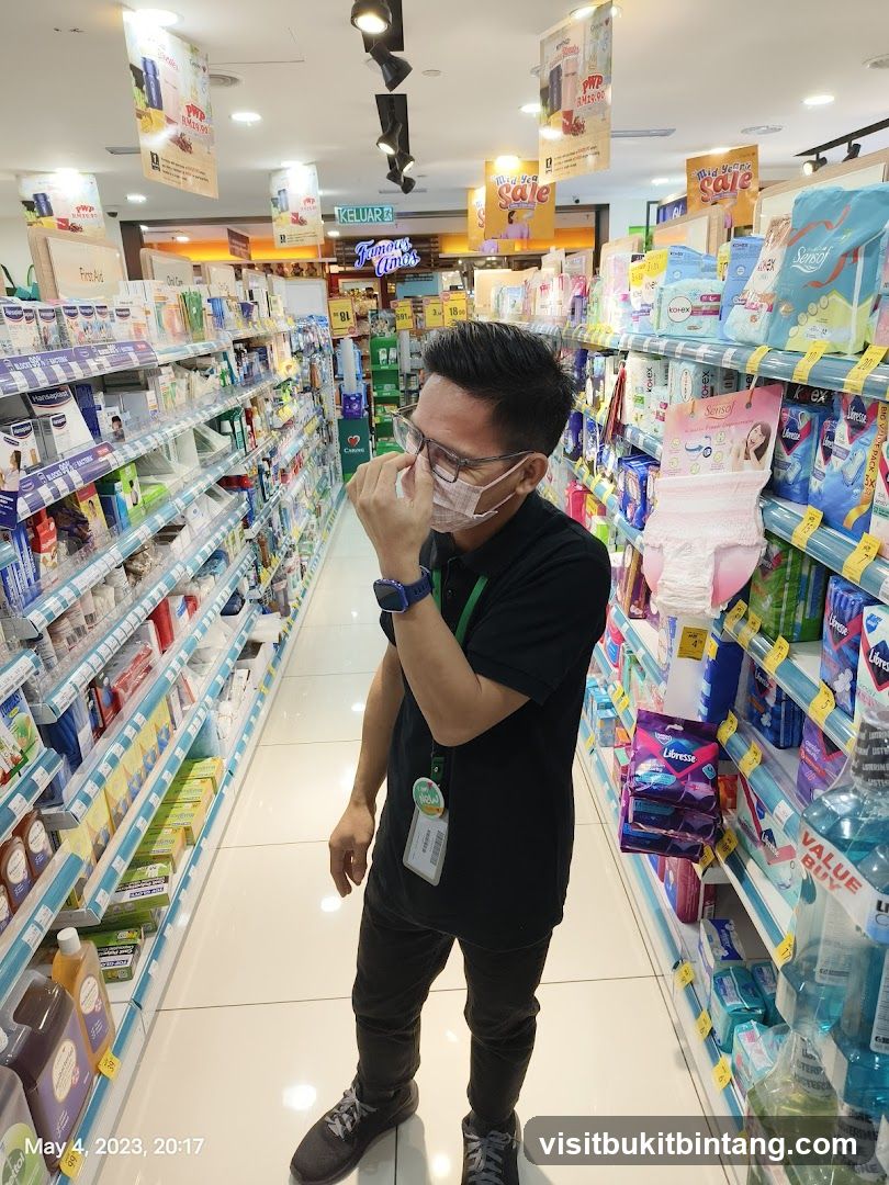 Man in Pharmacy Aisle