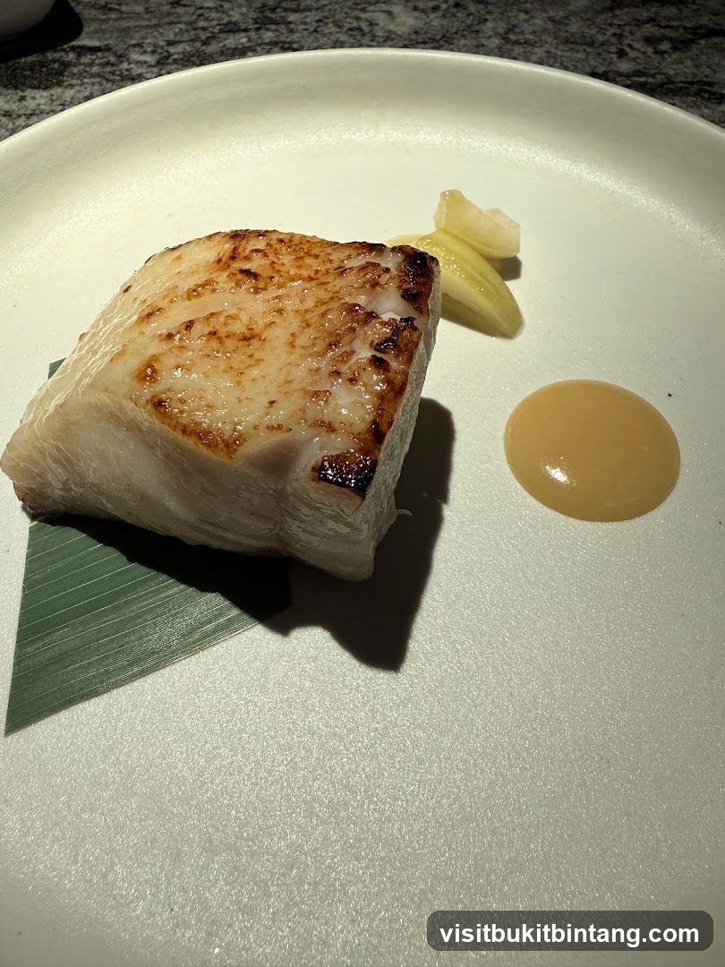 Seared Fish Fillet with Sauce and Garnish