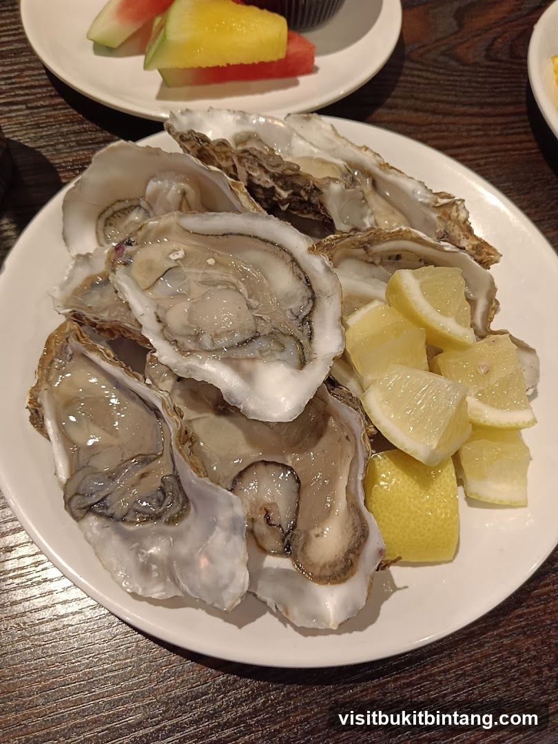 Oysters with Lemon Wedges