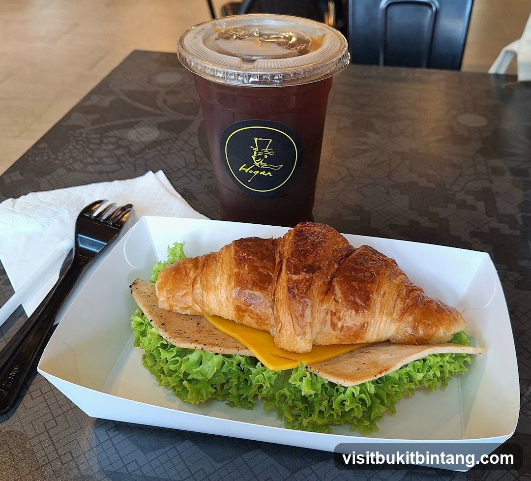 Croissant Sandwich and Iced Coffee