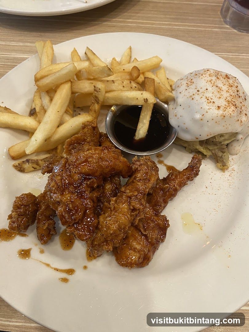 Chicken tenders with fries and sauce