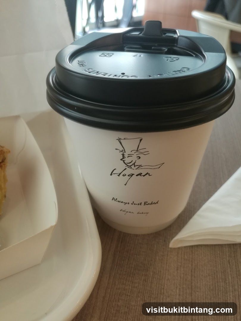 Coffee Cup and Pastry