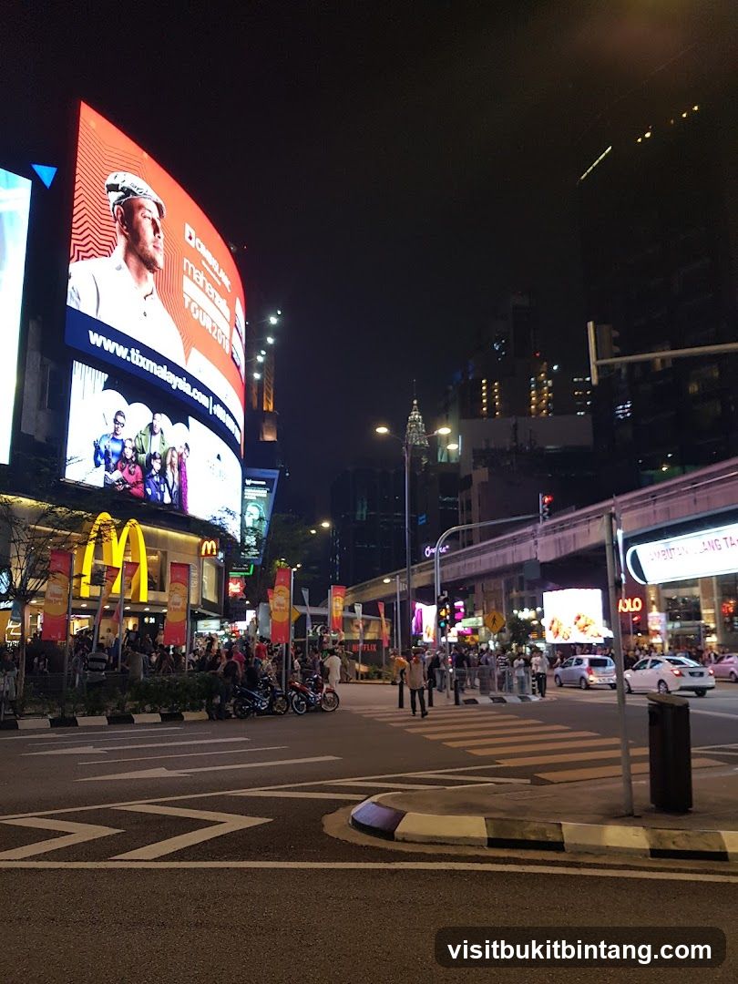 Night Street Scene with Billboards and McDonald's