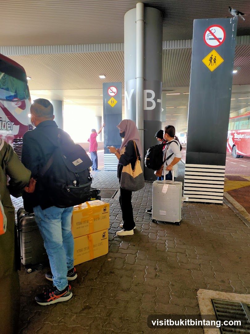 Passengers at bus terminal