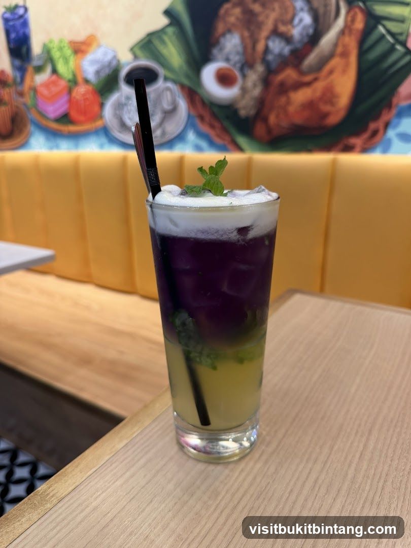 Layered Iced Drink with Mint Garnish