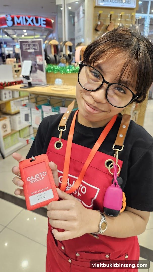 Staff Member with ID Badge in Retail Store