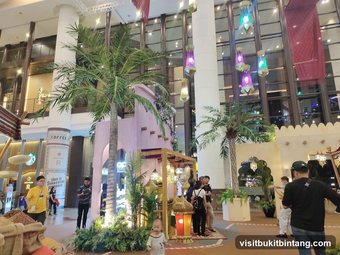 Mall Interior with Decorative Palm Trees and Lanterns