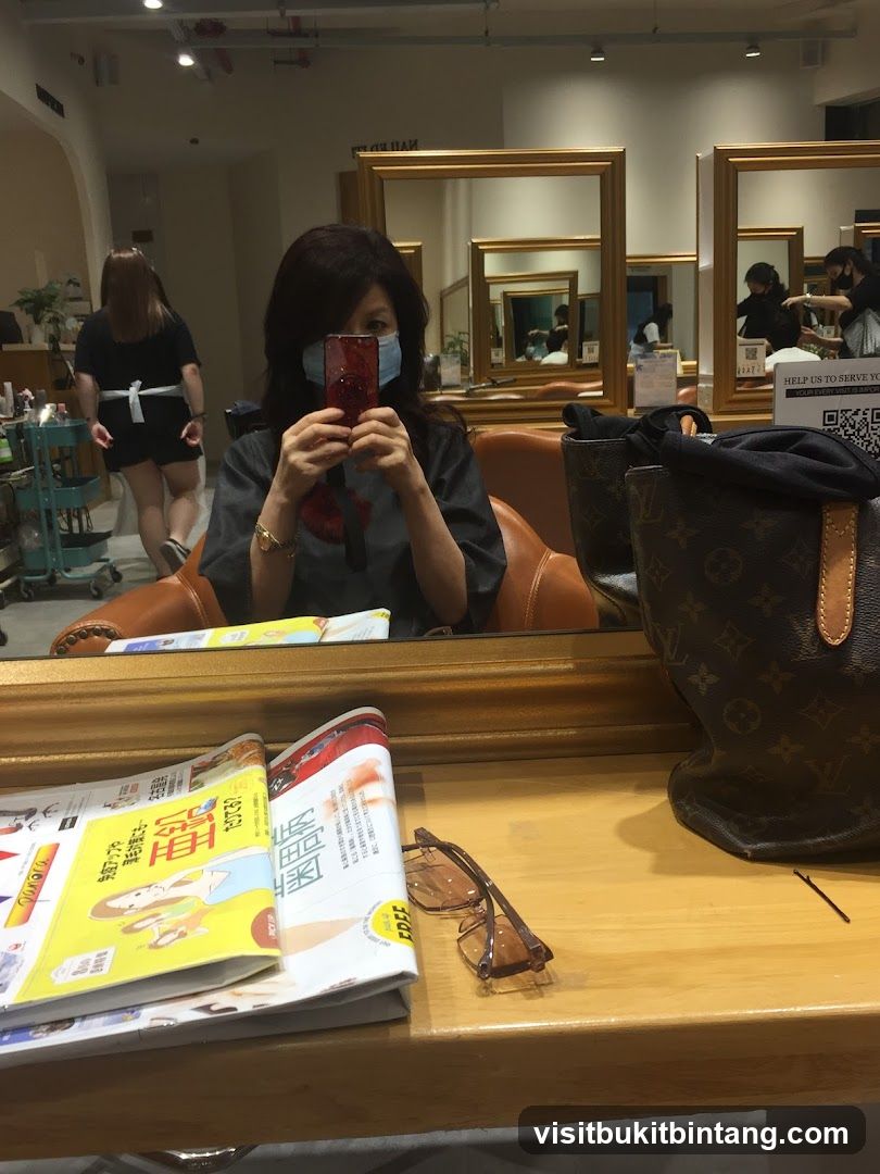 Woman taking a selfie in a salon