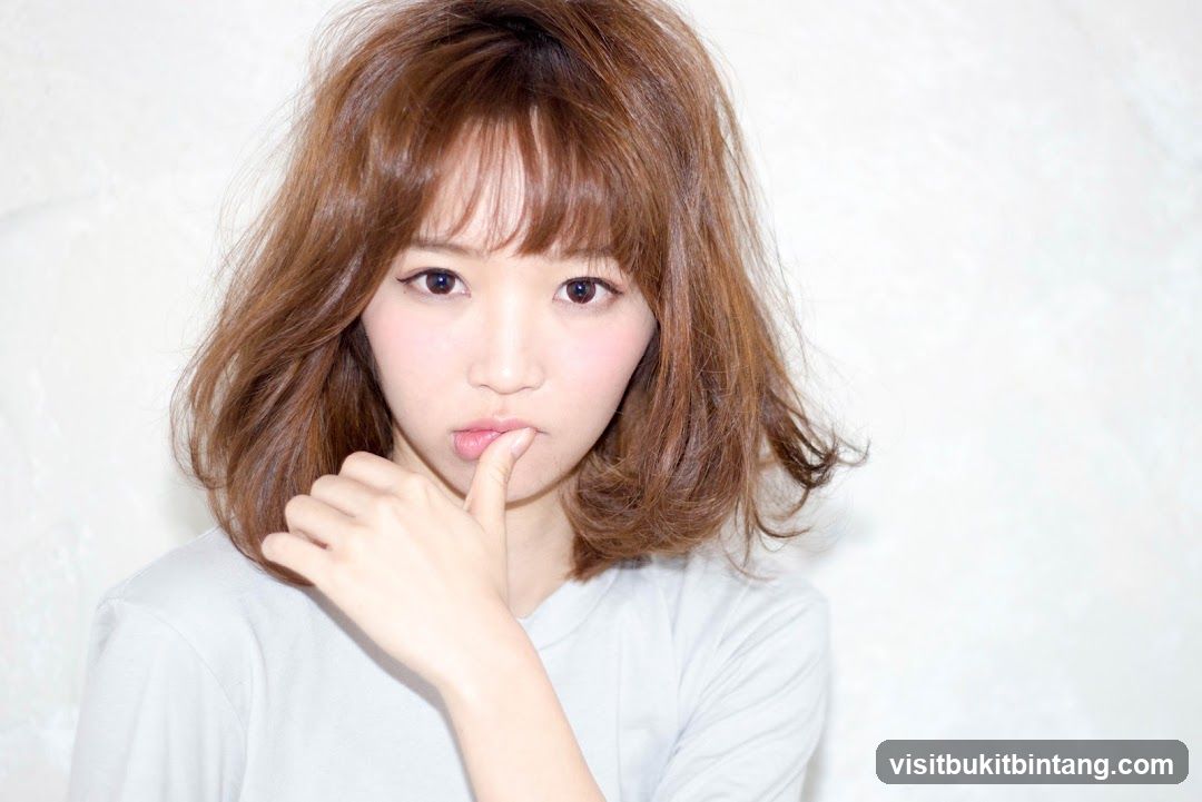 Young Woman with Brown Hair