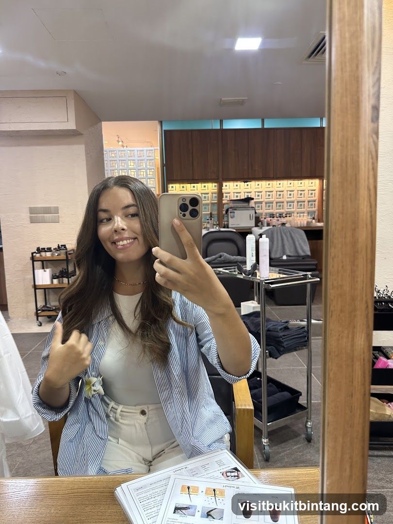Woman taking a selfie in a salon