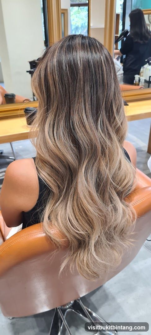 Woman with highlighted hair in salon