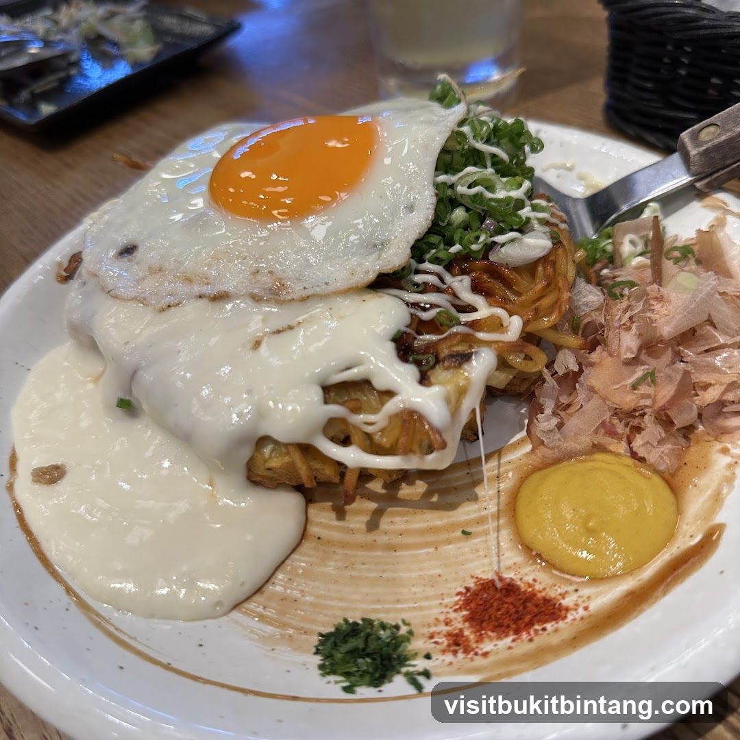 Okonomiyaki with Egg and Sauce