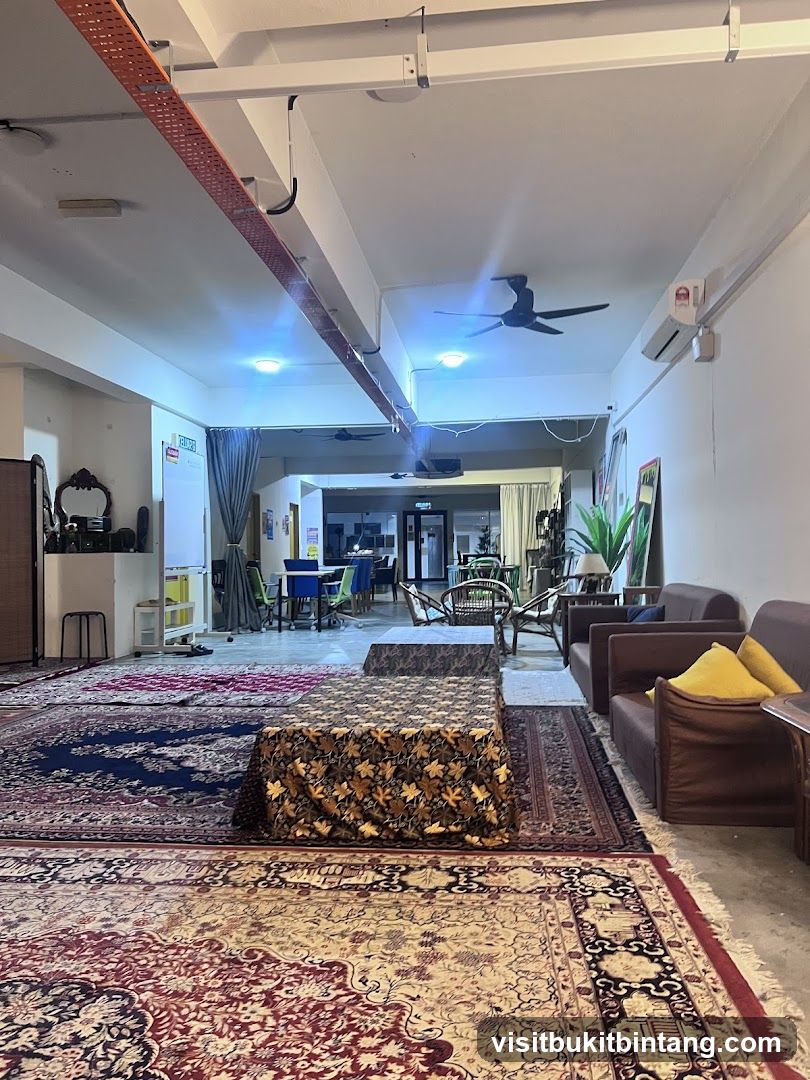 Interior of a lounge area with Persian rugs and seating
