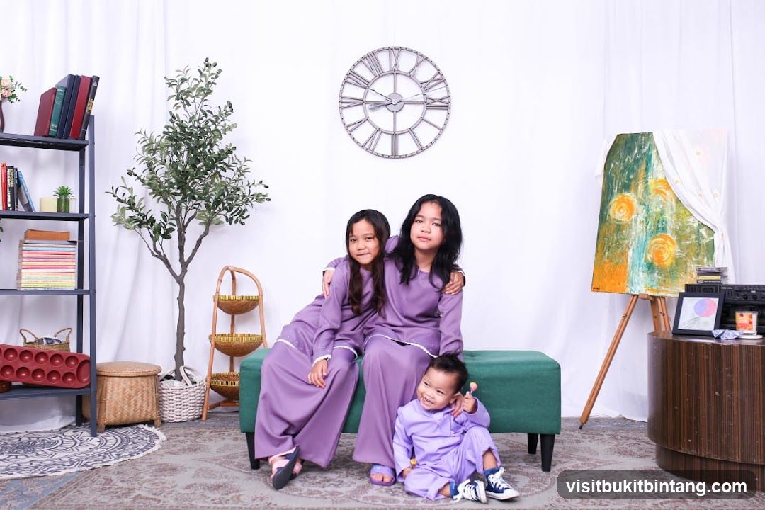 Three children in matching outfits
