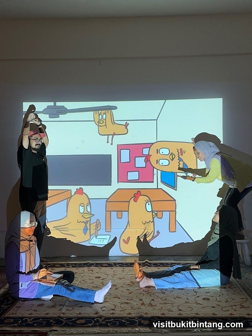 People watching a cartoon projection