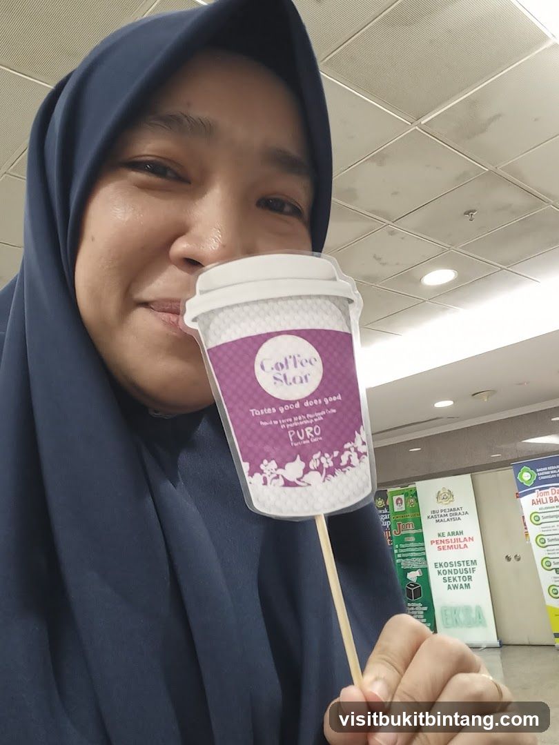 Woman holding a coffee cup prop