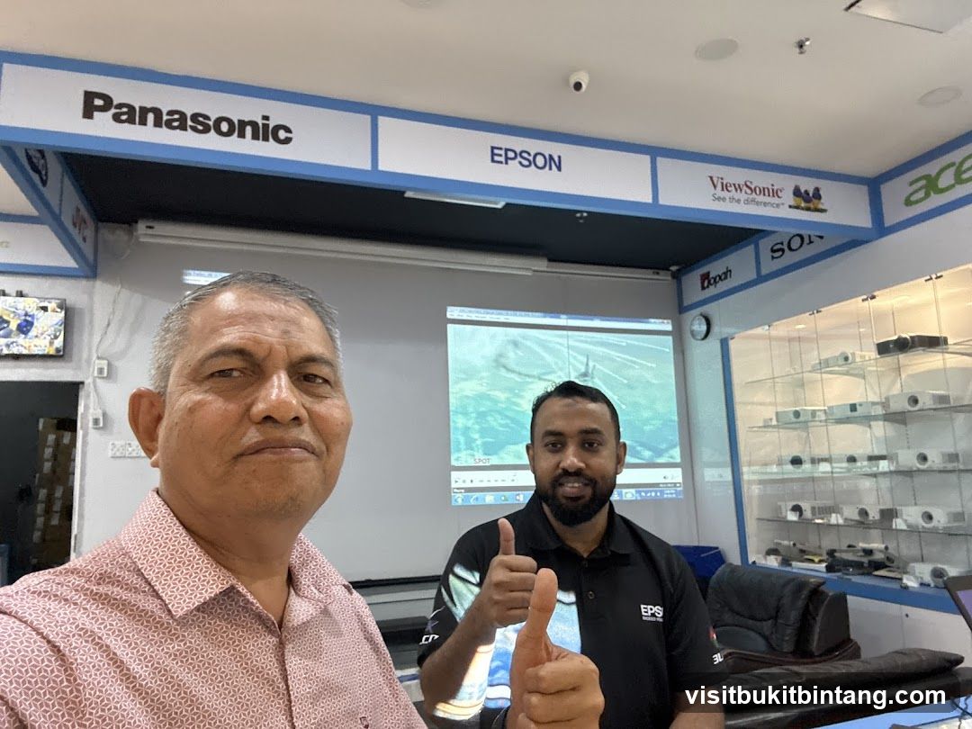 Electronics Store Interior with Staff