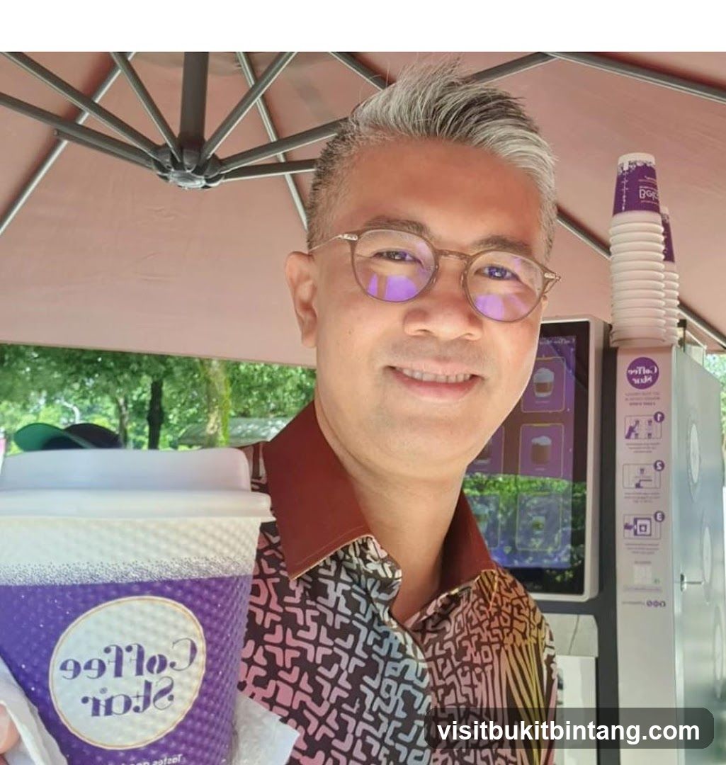 Man holding a coffee cup