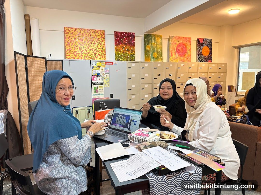 Women enjoying a meal and working