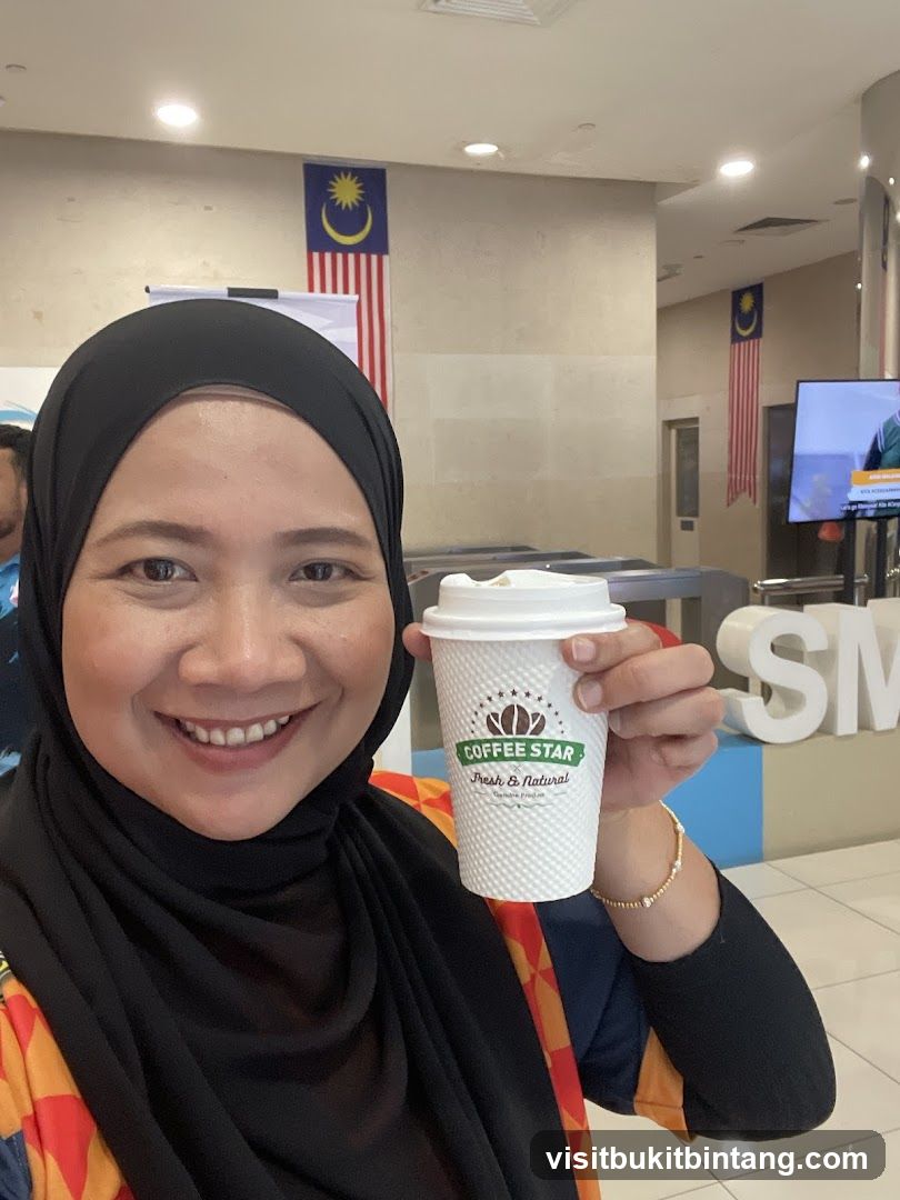 Woman holding a coffee cup