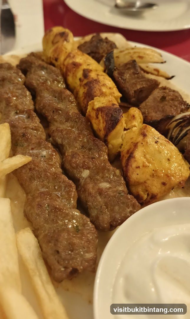 Grilled Meat Skewers and Fries