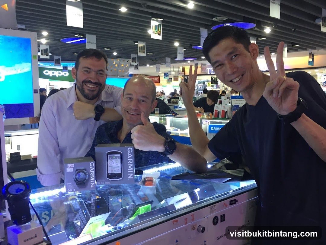 Electronics Store Interior with Staff and Products