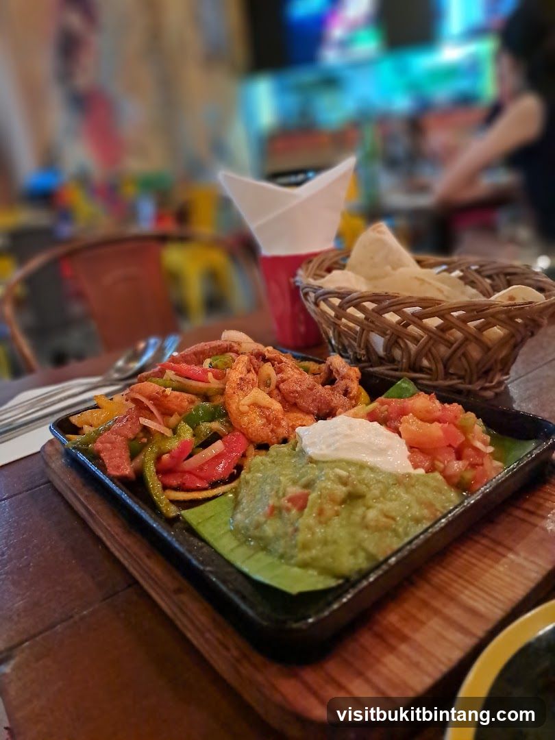 Sizzling Platter with Guacamole and Salsa