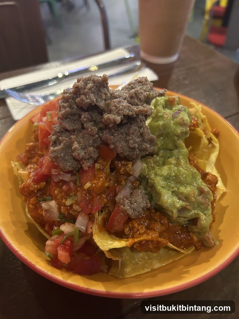 Loaded Nachos with Guacamole and Ground Beef