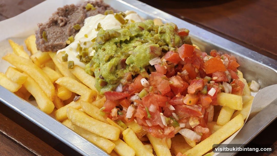 Loaded Fries with Guacamole and Tacos