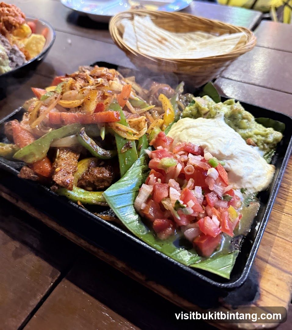 Sizzling Fajita Platter with Guacamole and Pico de Gallo