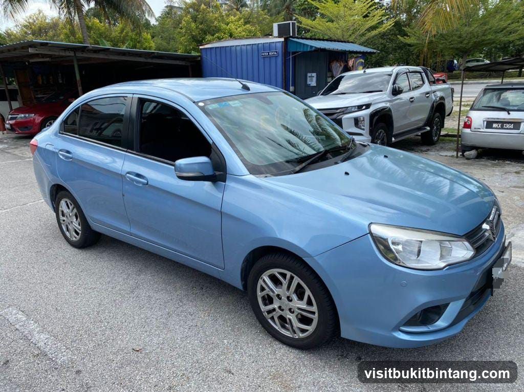 Light Blue Sedan in Parking Lot