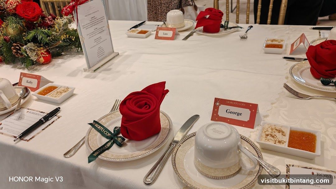 Dining Table Setting with Red Napkins and Name Cards