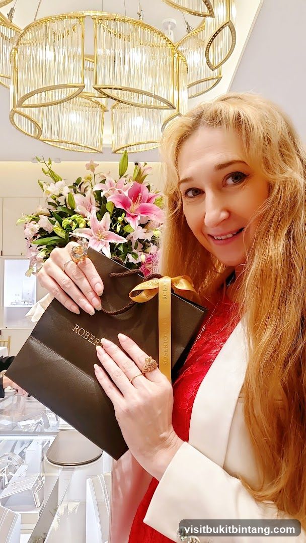 Woman holding shopping bag in store interior