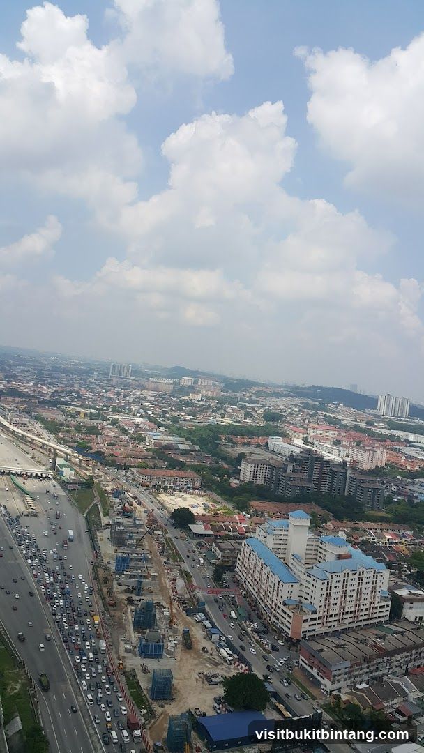 Aerial cityscape with highway and construction